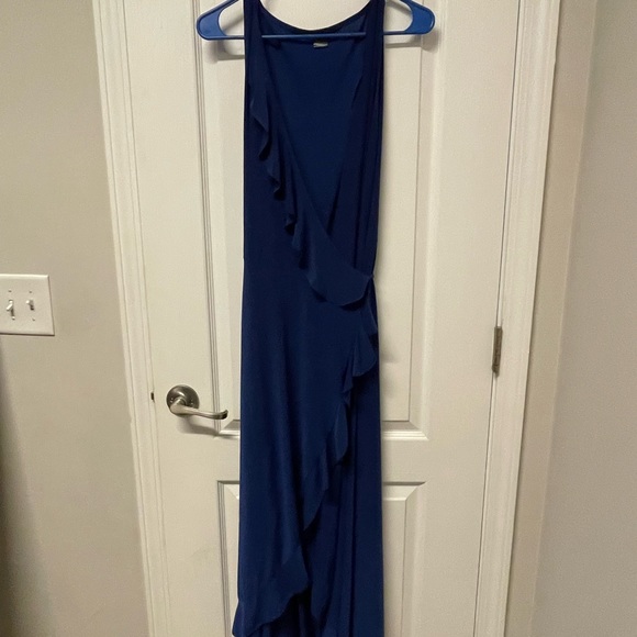 Sleeveless maxi wrap dress with ruffle detailing in a gorgeous shade of blue. - Picture 8 of 10